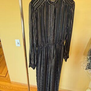 Vintage Jumpsuit by the designer Hélène Sidel, sold at iMagnin. Size Small